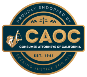 Consumer Attorneys of Calfornia logo emblem with blind justice balancing scales.